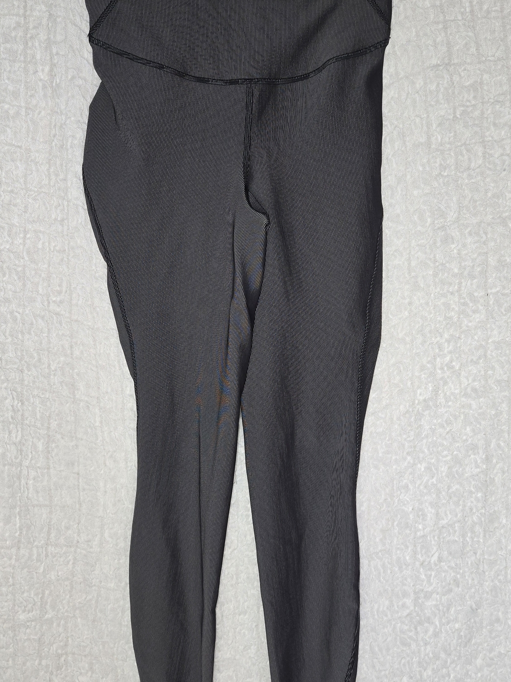 Lululemon Base Pace High-Rise Tight leggings featuring a black and gray ribbing